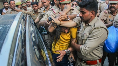 Police intervene as lawyers trash accused Sahil Shukla while he was being produced in a court in connection with Merchant Navy officer Saurabh Rajput's killing, in Meerut, Wednesday, March 19, 2025 (PTI)
