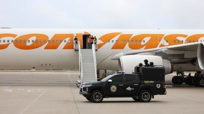A plane operated by sanctioned state airline Conviasa sits on the tarmac after carrying 311 Venezuelan migrants on board at Simon Bolivar International Airport in Maiquetia, Venezuela, on March 20, 2025. (AFP) A plane operated by sanctioned state airline Conviasa sits on the tarmac after carrying 311 Venezuelan migrants on board at Simon Bolivar International Airport in Maiquetia, Venezuela, on March 20, 2025. (AFP)