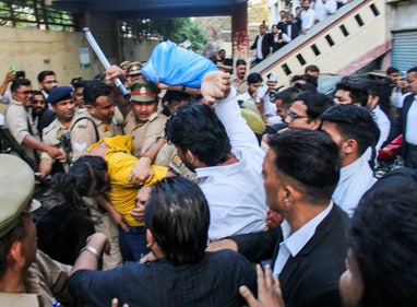 Meerut: Police intervene as lawyers trash accused Sahil Shukla while he was being produced in a court in connection with Merchant Navy officer Saurabh Rajput's killing, in Meerut, Wednesday, March 19, 2025. (PTI) Meerut: Police intervene as lawyers trash accused Sahil Shukla while he was being produced in a court in connection with Merchant Navy officer Saurabh Rajput's killing, in Meerut, Wednesday, March 19, 2025. (PTI)