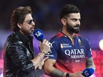 Royal Challengers Bangalore's Virat Kohli with Shah Rukh Khan before the match. REUTERS/Abhijit Addya