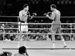 (FILES) US boxing heavyweight champions, Muhammad Ali (L) (born Cassius Clay) and George Foreman (R) fight in Kinshasa on October 30, 1974. (Photo by AFP) (FILES) US boxing heavyweight champions, Muhammad Ali (L) (born Cassius Clay) and George Foreman (R) fight in Kinshasa on October 30, 1974. (Photo by AFP)