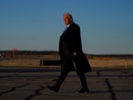 U.S. President Donald Trump walks at Morristown Municipal Airport in Morristown, New Jersey, U.S., March 21, 2025. REUTERS/Nathan Howard     TPX IMAGES OF THE DAY