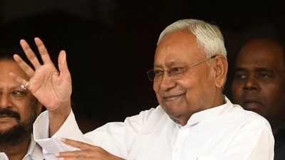Bihar CM Nitish Kumar was criticised by the RJD for talking and gesturing while the national anthem played during an event. (Santosh Kumar/Hindustan Times)