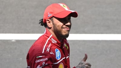 Ferrari's British driver Lewis Hamilton celebrates after winning the sprint race of the Formula One Chinese Grand Prix (AFP) Ferrari's British driver Lewis Hamilton celebrates after winning the sprint race of the Formula One Chinese Grand Prix (AFP)