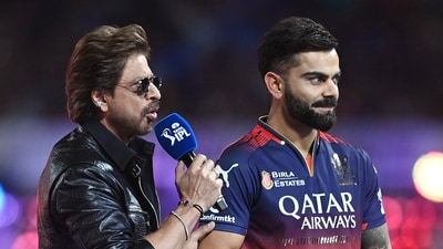 Royal Challengers Bangalore's Virat Kohli with Shah Rukh Khan before the match. REUTERS/Abhijit Addya (REUTERS)