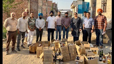 Excise department recovered 176 caps of expensive liquor bottles, 89 bottles of adulterated liquor filled in bottles of expensive brands, 164 bottles of cheap liquor and 171 empty bottle of expensive brands, in Ludhiana on Saturday. (HT Photo)