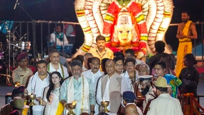 Karnataka Deputy Chief Minister D K Shivakumar with wife Usha, state Ministers Ramalinga Reddy and Dinesh Gundu Rao and others offer prayers. (PTI)