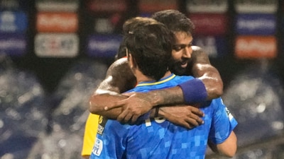 Hardik Pandya was seen hugging MS Dhoni during a practice session on Saturday. (PTI) Hardik Pandya was seen hugging MS Dhoni during a practice session on Saturday. (PTI)