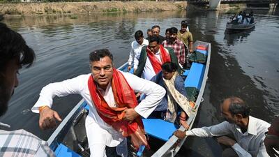 PWD minister Parvesh Verma inspects the Sahibi River and Najafgarh drain in Madipur in New Delhi on Saturday. (Arvind Yadav/HT Photo)