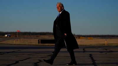 U.S. President Donald Trump walks at Morristown Municipal Airport in Morristown, New Jersey, U.S., March 21, 2025. REUTERS/Nathan Howard     TPX IMAGES OF THE DAY (REUTERS)
