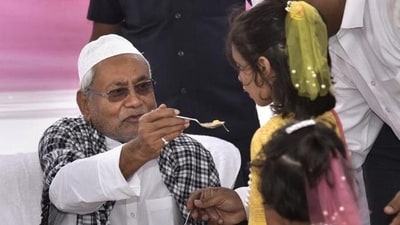 Bihar Chief Minister Nitish Kumar offers sewaiyan (a traditional sweet dish) to children after the Eid-ul-Fitr prayers at Gandhi Maidan in Patna, 2019. (PTI FILE ) Bihar Chief Minister Nitish Kumar offers sewaiyan (a traditional sweet dish) to children after the Eid-ul-Fitr prayers at Gandhi Maidan in Patna, 2019. (PTI FILE )