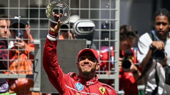 Lewis Hamilton celebrates winning the first sprint race of the 2025 F1 season, which is his first piece of silverware since switching over to Ferrari. (AFP)