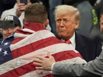 President Donald Trump, greets Oklahoma State's Wyatt Hendrickson. 
