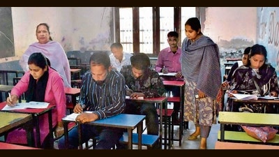 Candidates appearing for NILP exam at Government Senior Secondary School, Cemetery Road on Sunday in Ludhiana on March 23, 2025. (Manish/Hindustan Times) Candidates appearing for NILP exam at Government Senior Secondary School, Cemetery Road on Sunday in Ludhiana on March 23, 2025. (Manish/Hindustan Times)