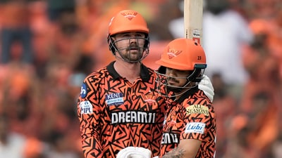 Sunrisers Hyderabad's Travis Head celebrates after scoring fifty runs as batting partner Sunrisers Hyderabad's Ishan Kishan congratulates (AP) Sunrisers Hyderabad's Travis Head celebrates after scoring fifty runs as batting partner Sunrisers Hyderabad's Ishan Kishan congratulates (AP)