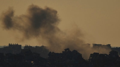 Smoke rises to the sky after an explosion in the Gaza Strip as seen from southern Israel. (AP) Smoke rises to the sky after an explosion in the Gaza Strip as seen from southern Israel. (AP)