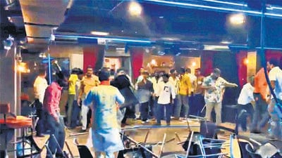 Late at night on Sunday, Shiv Sainiks led by Rahool Kanal and Kunal Sarmalkar attacked a comedy club in Khar where the song was filmed (screengrab) Late at night on Sunday, Shiv Sainiks led by Rahool Kanal and Kunal Sarmalkar attacked a comedy club in Khar where the song was filmed (screengrab)