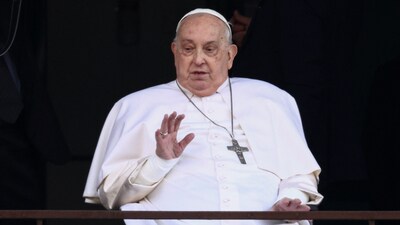 Pope Francis waves during his first public appearance in five weeks, on the day he is set to be discharged from Gemelli Hospital, in Rome, Italy, March 23, 2025. (Reuters)