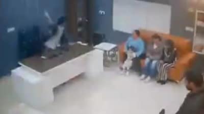 Self-styled pastor Bajinder Singh was seen throwing a pile of papers on a female follower in the viral video, (Screengrab/HT Photo) Self-styled pastor Bajinder Singh was seen throwing a pile of papers on a female follower in the viral video, (Screengrab/HT Photo)