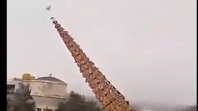 The incident occurred in Rayasandra, Parappana Agrahara in Bengaluru, when a towering 150-foot chariot, part of the festival’s religious procession, collapsed. (Screen grab from video) The incident occurred in Rayasandra, Parappana Agrahara in Bengaluru, when a towering 150-foot chariot, part of the festival’s religious procession, collapsed. (Screen grab from video)