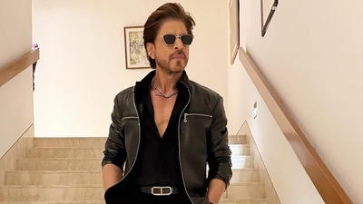 Shah Rukh Khan looks dapper in an all-black outfit and a diamond necklace for the IPL opening ceremony. Shah Rukh Khan looks dapper in an all-black outfit and a diamond necklace for the IPL opening ceremony.