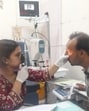 A doctor examining a patient, who experienced redness and pain in the eyes after applying an oil provided at a free hair treatment camp in Sangrur on March 16. (HT file photo) A doctor examining a patient, who experienced redness and pain in the eyes after applying an oil provided at a free hair treatment camp in Sangrur on March 16. (HT file photo)
