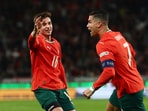Portugal's Cristiano Ronaldo celebrates with Francisco Conceicao after scoring their second goal