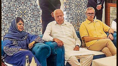 (From left) PDP chief Mehbooba Mufti, NC president Farooq Abdullah and J&K CM Omar Abdullah at an Iftaar event in Jammu on Sunday. (PTI) (From left) PDP chief Mehbooba Mufti, NC president Farooq Abdullah and J&K CM Omar Abdullah at an Iftaar event in Jammu on Sunday. (PTI)