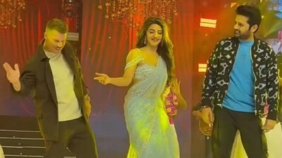 David Warner, Sreeleela and Nithiin dance together at the trailer launch event of Robinhood. David Warner, Sreeleela and Nithiin dance together at the trailer launch event of Robinhood.
