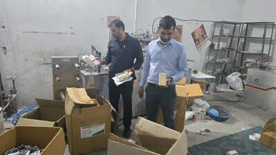 FDA officials during the raid on the illegal drug making unit in Sonepat on Monday. (HT Photo) FDA officials during the raid on the illegal drug making unit in Sonepat on Monday. (HT Photo)