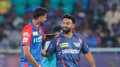 Lucknow Super Giants' captain Rishabh Pant and Delhi Capitals' captain Axar Patel talk after the toss. (AP) Lucknow Super Giants' captain Rishabh Pant and Delhi Capitals' captain Axar Patel talk after the toss. (AP)