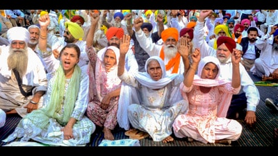 Jaswinder Kaur, wife of Colonel Pushpinder Bath, with others during a protest outside Mini Secretariat in Patiala on Monday. (PTI) Jaswinder Kaur, wife of Colonel Pushpinder Bath, with others during a protest outside Mini Secretariat in Patiala on Monday. (PTI)