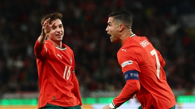 Portugal's Cristiano Ronaldo celebrates with Francisco Conceicao after scoring their second goal (REUTERS)