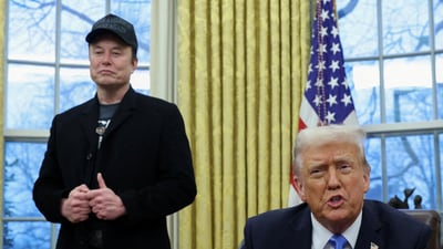 US President Donald Trump speaks next to Elon Musk and X Æ A-12, Musk's son, in the Oval Office of the White House in Washington. (REUTERS)
