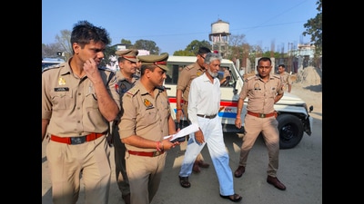 Zafar Ali, the Shahi Mosque Committee chief, being brought for medical examination, in Sambhal on Sunday (PTI) Zafar Ali, the Shahi Mosque Committee chief, being brought for medical examination, in Sambhal on Sunday (PTI)