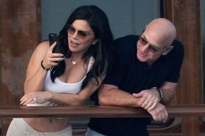 Jeff Bezos and Lauren Sanchez on their yacht Jeff Bezos and Lauren Sanchez on their yacht