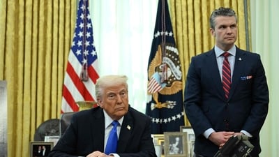 US President Donald Trump and Secretary of Defence Pete Hegseth listen during an event in the Oval Office of the White House in Washington, DC,. (AFP) US President Donald Trump and Secretary of Defence Pete Hegseth listen during an event in the Oval Office of the White House in Washington, DC,. (AFP)