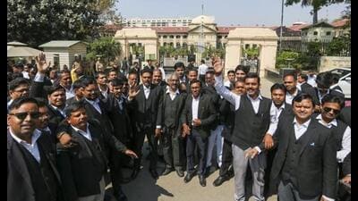 Lawyers during an indefinite strike over Justice Yashwant Varma’s transfer to the Allahabad High Court, in Prayagraj, Tuesday. (PTI Photo) Lawyers during an indefinite strike over Justice Yashwant Varma’s transfer to the Allahabad High Court, in Prayagraj, Tuesday. (PTI Photo)