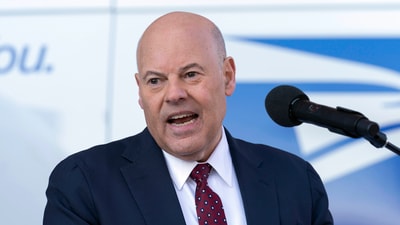 Louis DeJoy, US Postmaster General, resigns after 5 years in position (AP Photo/Jose Luis Magana, File) (AP) Louis DeJoy, US Postmaster General, resigns after 5 years in position (AP Photo/Jose Luis Magana, File) (AP)