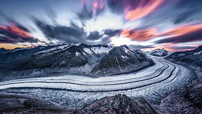 Aletsch Arena: A nature lover’s paradise Home to the magnificent Great Aletsch Glacier, the largest in the Alps and a UNESCO world heritage site, Aletsch Arena features lush meadows, wild-flower covered slopes, and stunning hiking trails. Car-free villages offer a tranquil escape complete with authentic Swiss cuisine. To get to Aletsch Arena, simply catch a train to Brig or Visp, followed by a scenic ride on the Matterhorn Gotthard Bahn and a cable car to Bettmeralp, Riederalp, or Fiescheralp. Read on to know about the top activities in Aletsch Arena. Aletsch Arena: A nature lover’s paradise Home to the magnificent Great Aletsch Glacier, the largest in the Alps and a UNESCO world heritage site, Aletsch Arena features lush meadows, wild-flower covered slopes, and stunning hiking trails. Car-free villages offer a tranquil escape complete with authentic Swiss cuisine. To get to Aletsch Arena, simply catch a train to Brig or Visp, followed by a scenic ride on the Matterhorn Gotthard Bahn and a cable car to Bettmeralp, Riederalp, or Fiescheralp. Read on to know about the top activities in Aletsch Arena.