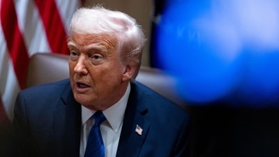 US President Donald Trump during a US ambassadors meeting in the Cabinet Room of the White House in Washington, DC, US, on Tuesday, March 25, 2025. (Bloomberg) US President Donald Trump during a US ambassadors meeting in the Cabinet Room of the White House in Washington, DC, US, on Tuesday, March 25, 2025. (Bloomberg)