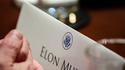 A name tag for Elon Musk, chief executive officer of Tesla Inc., during a cabinet meeting at the White House in Washington, DC, US, on Monday, March 24, 2025. Samuel Corum/Sipa/Bloomberg (Bloomberg) A name tag for Elon Musk, chief executive officer of Tesla Inc., during a cabinet meeting at the White House in Washington, DC, US, on Monday, March 24, 2025. Samuel Corum/Sipa/Bloomberg (Bloomberg)