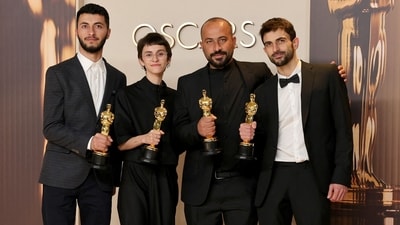 Basel Adra, Rachel Szor, Hamdan Ballal and Yuval Abraham, winners of the Best Documentary Feature Film award for No Other Land, pose in the press room during the 97th Annual Oscars at Ovation Hollywood on March 02, 2025 in Hollywood. Maya Dehlin Spach/Getty Images/AFP (Getty Images via AFP) Basel Adra, Rachel Szor, Hamdan Ballal and Yuval Abraham, winners of the Best Documentary Feature Film award for No Other Land, pose in the press room during the 97th Annual Oscars at Ovation Hollywood on March 02, 2025 in Hollywood. Maya Dehlin Spach/Getty Images/AFP (Getty Images via AFP)