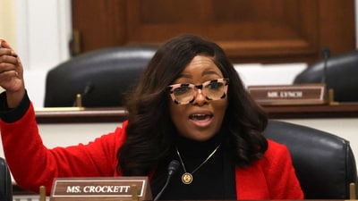 Jasmine Crockett was involved in a physical altercation with a correspondent for Laura Loomer after being pressed about Tesla Takedown remarks. ( (Photo by Alex Wroblewski / AFP)) Jasmine Crockett was involved in a physical altercation with a correspondent for Laura Loomer after being pressed about Tesla Takedown remarks. ( (Photo by Alex Wroblewski / AFP))