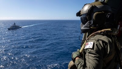 This handout photo taken on March 14, 2025, and released by the Australian Defence Force shows Royal Australian Navy Leading Seaman Bradly Kingston on board an MH-60R Seahawk helicopter flying near HMAS Toowoomba while conducting flight operations in an exercise area located off the coast of Western Australia. (AFP) This handout photo taken on March 14, 2025, and released by the Australian Defence Force shows Royal Australian Navy Leading Seaman Bradly Kingston on board an MH-60R Seahawk helicopter flying near HMAS Toowoomba while conducting flight operations in an exercise area located off the coast of Western Australia. (AFP)
