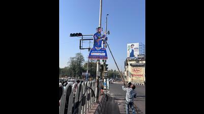 A worker removing one of the cutouts from the Hazratganj area (HT Photo) A worker removing one of the cutouts from the Hazratganj area (HT Photo)