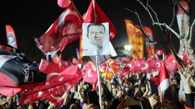 The biggest protests Turkey has seen in more than a decade have been sparked by the opposition's condemnation of the action as politically motivated. In pic: Protesters shout slogans and hold banners amidst protests in Turkey. (AP)