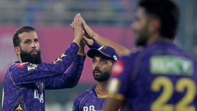 Varun Chakravarthy and Moeen Ali dismantled the Royals' middle order, picking up two wickets each in successive overs right after the powerplay, shifting the momentum in KKR’s favour.  (AFP)