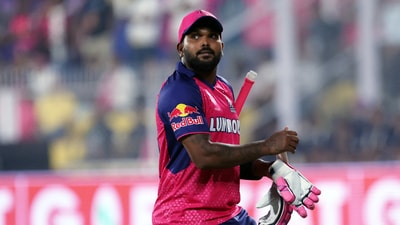 Rajasthan Royals' Wanindu Hasaranga walks back to the pavilion after losing his wicket, caught out by Kolkata Knight Riders' Ajinkya Rahane (REUTERS)