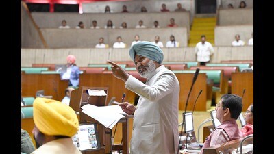 Finance minister Harpal Singh Cheema presenting the Punjab Budget in Chandigarh on Wednesday. (Ravi Kumar/Hindustan Times)